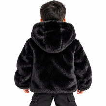 Load image into Gallery viewer, A child viewed from behind wearing a black faux fur hooded jacket and black pants against a plain white background.
