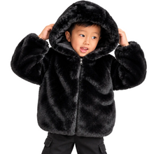 Load image into Gallery viewer, A young child wearing a black plush faux-fur hooded jacket with a front zipper, holding the hood up against a plain white background.
