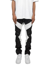 Load image into Gallery viewer, Black and White Leather Pants
