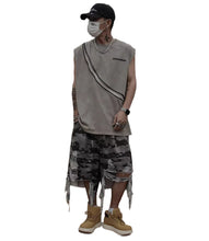 Load image into Gallery viewer, Camo Shredded Jean Shorts
