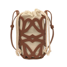 Load image into Gallery viewer, Leather Hollow Out Mini Bucket Hanbag
